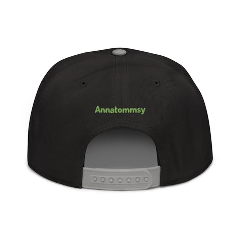 Annatommsy - Snapback-Cap mit Stick